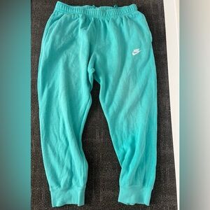 Large turquoise Nike sweats
